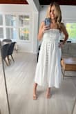 I bought size S, Runs a little big especially if you have a small chest. Size down because the dress is gorgeous and worth it. Really love it! - Adriana F.