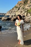 This dress was perfect for my casual beach wedding in Greece. Floaty, romantic, and beautiful. It is prone to wrinkles but steams nicely. Love the sleeves and slit. Great value. - Quinn C.