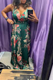This dress is beautiful. The material is quality and the colors are gorgeous. I typically don't wear long dresses because I am short but this was flattering. I had to have it altered but think this is a beautiful piece to have in my closet. It would be nice to see this dress and others in a shorter version. The front of the dress seam folds over and won't stay flat. - Lydia T.