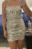 At first when I tried it on I felt that I was a little loose on the top of my butt but on the day of the bachelorette the dress adapted perfectly to my body throughout the night. I danced a lot and it never got on me. And the best thing is that everyone loved it = - Eglee G.