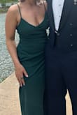 This is the second time I've purchased this dress. The first one was black, and this was dark green, and I absolutely love both. The only thing I'd offer is getting it hemmed if you're a short girly not wearing 3-inch or higher heels. I wore 2-inch heels and kept stepping on the bottom hem of my dress while dancing. I'll get it hemmed before the next event. - Courtney T.