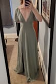 I bought this dress for an outdoor summer wedding and couldn't be happier with it! The material is thick but breezy - it's not at all see through but will breathe beautifully. The waist ran a bit big (I'll be getting it taken in by an inch or two) but even if I didn't, it'd still fit very nicely. 

I absolutely adore the color, really true to what is shown online. - Katie C.
