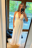 This dress was absolutely perfect for our small, laid-back backyard wedding! I loved having the adjustable straps and my chest felt completely secure with the right amount of cleavage I wanted exposed. The cups have enough lining that I didn't require a bra & a big plus for me! The empire waist flattered my apple shape and with heels the length was good. I did step on my dress a little bit but was able to walk down the aisle just fine. I felt like a goddess in this dress and it paired beautifully with my hat! - Jaime R.