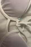 I was happy with this bikini top until the underwire poked completely through in the bust. Very disappointed because it was only after one wear. Would not recommend it. - Hannah F.
