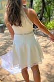After years of trying to plan a wedding, we decided to elope! Since we live in southern Arizona and our little ceremony was in mid-June with regular temps in the 100s, I wanted something that would allow my body to breathe (and sweat) without causing too much discomfort. When the dress arrived, I was surprised at the quality of the material and just how nice it was. Everything about the dress fit perfectly, which is not something I get to experience often!
One thing worth noting is that this is not a pure white; it's more ivory or off-white in color.
At 4'11", I'm quite petite and my build is a combination of slender and athletic. The material was really beautiful and flattering, and to avoid wearing a bra I chose to wear some Nippies nip covers and they worked out great. No fussing with a bra and everything looked seamless.
This dress can be with again for any other type of celebration or vacation, but I love that I wore it to get married to my best friend. - Lynn B.