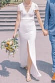 I wore this for our wedding and it was perfect. Such soft and stretchy lace making it comfortable and cool yet fancy. I liked the symmetrical slit rather than on one leg, and it never felt "too high" of a slit. Loved it. - Jillian S.