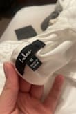 I ordered an xl. Not even looking at the size on the dress. I was going to return but loved it so much thought about trying to get it altered. I tried it on one last time to see if I was going to be able to use it as a bridal shower dress and realized it's a medium. - Megan A.