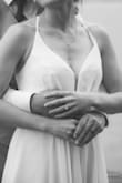 I wore this necklace with my wedding dress (also from Lulus) for an intimate ceremony and it looked great. It did flip around a little so had to be fixed a few times for photos, but otherwise, I really like it. - Devin C.