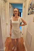 I got this dress for my bridal shower, and I love it! It's perfect for the occasion. Not see-thru like most white dresses from other brands. Straps are 100% adjustable since it's a tie strap, which is nice. I found it to be a little large in the waist. I would've liked if the waist was a tad more form-fitting, but I still think the small is OK! - Kayla T.