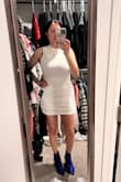 I was happy with the purchase. Very comfortable and lightweight dress. The only area that was a little large on me was the underarm area. It was just a little loose. If I was to buy it again I would have sized down to a small, but normally I am afraid to do that due to my breast size. - Sarah Q.