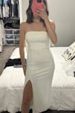 This dress is my dream- it has all of the things I was looking for for my bridal shower. The bow, the length, strapless, and the material is great (stretchy, soft.) However, this dress is SO heavy! I tried it on and was uncomfortable just walking around the house. It felt like it was being pulled down on me. The bow is detachable and that helps with some of the weight, but the dress itself is heavy too. I love this dress, I just was not comfortable feeling like it was weighing me down, so I had to return. - Kelsey S.