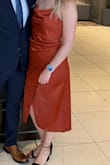 Absolutely love this dress! Wore it to a wedding and felt like a million bucks in it! The material is great quality and it fits perfectly true to size! A little bit more fitted through the hips/waist/butt, and the cowl neck at the top is just perfect! Love it and want it in every color! - Alexi M.