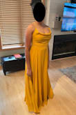 This dress is stunning. I love the way the skirt flows and fits at the chest.  It's very flattering, fun, and comfortable to wear. I tried on 15 dresses from different designers/stores to decide on a dress for a black tie party and landed on this one in the end. My only critique is I wish there were more colors. The yellow is more mustard (as the name says) than canary like the photo and at the time of purchase, there weren't many other color options (rose, sage, and black). - Bryana F.