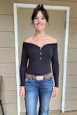 I love this top! It's a little tight, but because of the stretchy material, it hugs my curves in all the right places. I'd recommend a strapless bra or pasties while wearing this top. - Stephanie V.