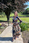 The dress was super comfortable! Perfect for the warmer weather and when it cooled off later that night. The dress was long enough even with my heels. - Kathleen M.