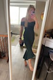 Material is a little stiff but this is a super cute dress. A little big in the hip area but it's really flattering otherwise. I might wear this to a wedding - Emma M.