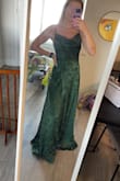 The top was too big and the bottom was too long. The cowl neck sat weird on me so I returned it - Emma M.