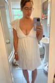 I love this dress and it's very comfortable and of great quality. I ended up returning it though because it doesn't hold in my boobs. I'm all for the cleavage but the triangles on the top just didn't work out. The cutouts on the top barely covered my nipples when my boobs were in place or I let them fall beneath that line and it just didn't look right. My bra could be seen from any angle. It was big in other places like the sleeves and where the arms met the top so if I got a bigger size it would have been way too loose everywhere else. - Katelyn C.