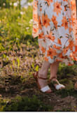These simple sandals are amazing. I am at a point in my life in which I am not interested in sacrificing comfort and practicality for style, and I feel that this sandal is a perfect compromise. They can be dressed up a bit, as they are here for our family photos, or dressed down. I have worn them to work and found them comfortable throughout the day, (And as a special education teacher, I log a ton of steps each day.) I purchased two different colors and they are undoubtedly the best investment I made in my summer wardrobe this year. - Lisa K.