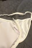 Loved the quality, look and style of this bikini but the underwire broke through after the first wear. I washed it on delicate once and did not dry it however it still broke. Love all my Lulus stuff so this one was a little disappointing, especially for the price. - Liz S.