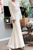 Bought this to try on for my wedding. It was a bit baggy in the arms and chest area. Returned and might size down. - Maisie T.