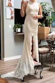 This dress was really cute, I got it for my wedding but the lace didn't seem as elegant as I wanted. Felt comfortable to walk in, but has a long train. - Maisie T.