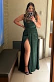I purchased this dress for a Gala event for work, I was obsessed and so were others. The dress hugs your body beautifully and it's not as heavy as one would think! 
BEWARE: the slit is HIGH! I could not dance or sit without having to hold on to the dress. It's worth buying - Natalie R.
