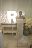 I wore this dress for my bridal shower. I originally ordered 2X but it was really tight around my hips and thighs. I returned for a 3X and had it taken in by a tailor. I love this dress! I received so many compliments - Candace C.