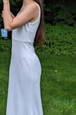 I purchased this in white for engagement photos.
Pros:
- Not sheer at all! I tried it on with black underwear first and you couldn't really see them
- Stretchy material for a forgiving fit
Cons:
- The lining isn't very slippery and kept bunching up, which showed through as folds under the stretchy outer material
- Due to the material, bumps from undergarments will show
- The adjustable straps don't lay flat when tightened and make the dress look cheap
Fit:
Runs big! According to the size chart, I should be between an XXS and an XS. Fit finder recommended XS but I ordered both to be safe since I wouldn't have time to exchange. The XXS was actually too big! Especially in the bust. My lower body (hips/waist) which are more of an XS were just barely able to fill out the XXS and there was still some looseness in the hips. I did end up wearing the XXS for the shoot because I was short on time to find an alternative and returned the XS. My measurements are 31 bust-25 waist-35 hip. I'm 5'2" and wear a 28C bra. - Allison P.