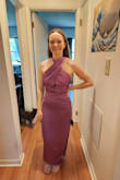 I bought this dress to wear to a friend's wedding, and it did not disappoint! It fits true to size and is pretty comfortable. Love the halter neckline. I'm short, so I'd say the length is closer to maxi than midi for me, but it still works without needing to get it tailored which is a big plus! - Kayla T.