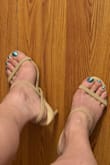 In one or some of the reviews, I think someone commented the straps are stretched out & I thought so too, but the long middle strap wraps around the heel & the back strap wraps across the top of the foot. These are really high & I hope I don't fall & break something! - Pamela B.