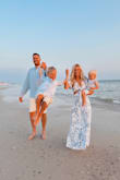 Love this dress! The colors and flowiness are perfect for a beach vacation and beach photoshoot! Took some family photos in it and it looks beautiful! Would definitely recommend! Needed to wear nipple covers, as it is low cut. It was also a little long on me, but I really liked the length! - Shelby A.