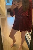 After waiting, this romper finally went on sale and I grabbed the last XS available. I didn't expect it to be as sparkly as it was, such a pleasant surprise! I saw other reviewers complain about the back part being too short; however, because I'm not tall, it fits perfectly. I'm actually really happy with the butt area because many things I order that aren't specifically for petite women end up being way too long. My only gripe is that the chest area could be a little tighter. - Ashley J.