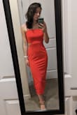 Bought this dress to wear to a friend's July wedding, it was a big hit. Thick but not heavy material, very comfortable and it has a silicon edge on the inside of the top so you don't have to worry about anything slipping. Fit perfectly at a very flattering midi length! - Sierra F.