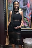 I'm normally a small but I ordered a medium b/c I am 5 months pregnant. However, I still had room in the back which I'm not complaining b/c it still fit cute. It wasn't too tight and it was really comfortable - Kera L.