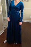 Brought for a wedding. Originally ordered a large but it was too small, tight across the shoulders and arms. I carefully read Lulus return and exchange policy before ordering and knew the rules. I made sure to try it on in a room without fuzzies, hairs, or anything that would tamper an exchange. Exchange was successful and the XL fits! I wear size 12. The fabric is soft and the color is stunning. Can't wait to wear it to a wedding. - Meghen V.