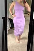 This dress is so comfortable and feels great on. The ruching helps hide a bit of a mommy tummy, and the wide strap lets me wear a bra. That kinda stuff is important to me! But it also looks great on. I got a ton of compliments wearing it. - Kathleen T.