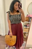 Love this top! The tie sleeves are the perfect details. Goes well with jeans or a skirt! I only gave 4 stars due to the sleeves coming untied or loosening randomly. Just need to keep an eye on them lol but otherwise great! - Joelle H.