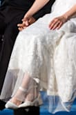 Alright ladies interested in this dress - I gotchu!
Backstory: I was eloping on a budget. I was nervous about this dress because I couldn't order custom sizing like the other dress from a different company I was interested in. But this was the best dress I could find that was inexpensive but still bridal so I took the risk and got it.
My thoughts: it's great for a budget. The length was honestly just barely passable with my short height. I bought an underskirt to help and I had small heels. Those combined were just enough to make it not drag badly. But learn from my mistake and don't buy an underskirt with just the one wire at the bottom. It shows. Ruined some of my photos, imo.
Honestly I hate the back of this dress. But my hair and veil covered a majority of it so it was fine. And having the adjustable back is the only reason the dress even fit in the torso. so, give and take. Finding a bra was awful.
Notice my photo that shows how there are 3 layers to the skirt, I couldn't tell from this listing. - Samantha I.