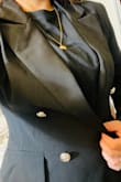 It's awesome I love the gold buttons 
It does fit a little tight when I raise my arms if your in between sizes and want mobility maybe size up - Jennifer G.