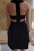 This dress rocks. The fabric is thick and quality. The front is girly and modest with a really pretty, sexy back. It can be used for so many occasions. Love the feel and fit too. Only problem is I need someone to help zip up midway lol - Kim V.