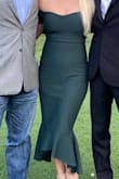 This dress fit like a glove. It was fitted and hugged all the right places. It was so flattering and made me look like I had an hourglass shape.   I received so many compliments.  It's a little snug getting it on (no zipper) but once it's on it's perfect. I wish I had another event soon so I could wear it again. - Karen H.