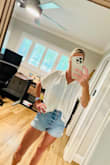 I looked at this shirt for so long before finally pulling the trigger because I hate going through the return process. I AM SO GLAD I GOT IT. I am living in this shirt now that it's summer and it's great for casual wear, beach cover-up, you can dress it up.... It is so classy and so adorable! It runs just a little large but that's the way it should - if you're on the fence about getting it - JUST GET IT! - Laura H.
