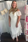 Loved this dress, it was the perfect vibe for my bridal shower. I was between sizes - the L was tight when sitting and the XL was slightly big on me but a lot more comfortable! I ended up keeping the XL. The pattern is subtle but super pretty. - Kayla R.