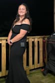 I love this dress and will be wearing it to 2 weddings this fall! It fits so perfectly and is stretchy and comfy. It definitely fits true to size and the material is thick enough to not need a bra! Ignore the fact that I'm just modeling for friends in the picture and not dressed up for the wedding since it's in August lol. - Megan J.