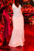 I got this dress as my back up reception dress. I ended up wearing it and I'm glad that I did. It stretches so it's was to dance in. The sequins adds glamor and I got so many compliments. - Albertine J.