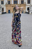 Definitely the most gorgeous thing I own. It's so beautiful, I got so many compliments on it all night, it fits great, not uncomfortable, super flattering, etc etc etc. The flowers may need to be ironed out or otherwise fiddled with to make sure they're not folded over but I mean honestly I don't have any complaints about this dress. Love love love - Jennifer K.
