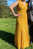 I really loved this Dress! There is some gapping on the open back, but over all it fits super well and is very cute and summery. The loop for the button on the back broke the first time I put the dress on, but I was able to resew it and it held after that. - Caroline W.