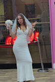 This dress fit me perfectly. Enhanced my curves and showed some cleavage, but not too much. Beautiful dress. - Alyssa W.