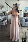 Was super excited when I order this dress, but it showed up two toned. Really wish the bodice and skirt matched. Fit was nice though. - Nicole U.